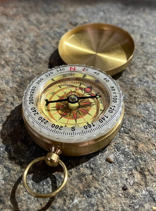 Gold compass